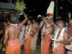 This fellow lead the procession of the woman.  He seemed to be in a delirium or trance and was semi-supported by the people around him.