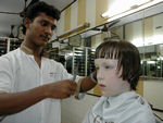 Maggie getting a haircut.  
