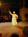 This fellow used finger cymbals.  During this part of the performance, individual musicians came forward to play and dance.  At first, I thought this fellow just looked silly, but as he danced and played, I realized that he was impressively graceful - entrancing.