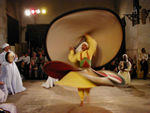 The dervishes wore things like skirts in layers which they untied and spun separately before handing them to someone else.  