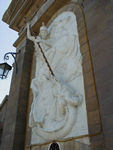 St George doing what he is known for.  Though he is the patron saint of England, he was from the Middle East.  Stories about him probably came to England with the returning crusaders.