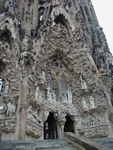 The nativity door looks like a cascade of liquid stone.  It's topped by a green christmas tree with white marble doves circling it.  The sculptures are realistic and sensitive