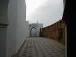 Deserted medina with wall built by Portugese on right