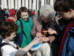 Pilgrims get their religious items ready for blessing