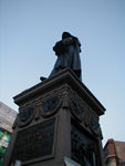 Statue of Girodano Bruno in Campo d'Fiori. Bruno was a philosopher, astronomer, mathematician, and occultist whose theories anticipated modern science. The most notable of these were his theories of the infinite universe and the multiplicity of worlds, in which he rejected the traditional Earth-centered astronomy.  Bruno stuck to his ideas despite a seven-year trial before the Roman Inquisition.  Pope Clement VIII declared Bruno a heretic and sentenced him to death. On February 17 1600, Bruno was brought to the Campo de' Fiori, his tongue in a gag, and burned alive.
