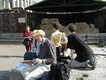 Our picnic spot.  Sitting in front of the Temple of Divus Iulius.  After Caesar was assasinated, his body was carried to the Forum and burned on a pyre.  An altar was built on the spot and then a temple.  Augustus, Caesars adopted son, had his father honored as if he were a god by dedicating this temple to him.  People still leave flowers on what remains of the temple.