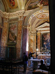 Exploring St. Barbara's church.  Barbara was a christian martyr.  According to tradition, she was young and attractive.  Her beliefs upset her parents, so they sent her to her room - actually they locked her in a tower - but she escaped.  Tired of just nagging her at the dinner table, her father beheaded her.  He was immediately struck dead by lighting.  