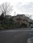The house we're staying in.  There are garages on the first level; we're on the second; and the fellow on the third lives in Perugia.