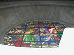 Someone taller looking at the stained glass window.  Duncan took it because he is taller.