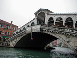 The witches hung a stocking from the Rialto Bridge and then handed out candy to the kids.