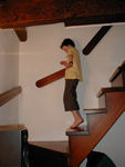 Maggie showing us what Monica would look like at Versailles - on the apartment stairs