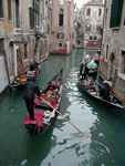 Gondolas have been black since 1562.  They are 11 meters long, made of 280 different pieces of wood, and is painted with seven layers of balck paint.