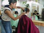 Getting haircuts, the worst haircuts of the whole trip.