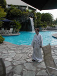 Elegant young woman poolside