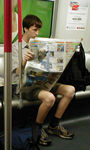 Duncan reading a newspaper in Chinese