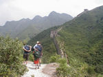 Standing on the roof of one tower.  During the reign of the Han emperor Wu-ti (141/140-87/86 BC) the wall was strengthened as part of an overall campaign against the Hsiung-nu. From that period the Great Wall also contributed to the exploitation of farmland in northern and western China and to the growth of the trade route that came to be known as the Silk Road.