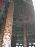 The centre of the stone-paved floor is a round marble slab that has a design of a dragon and a phoenix--traditional symbols of king and queen. The hall has no walls, only partitions of open latticework doors.