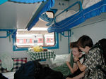 Tote and Maggie goofing around.  Unlike the Indian trains, one can see out of the large, clear windows.