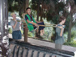 All over the mountain, these orange-vested guys hang our with their bamboo carriers to give people a ride up.  Their rates are fixed.  They don't have much to do this time of year, but they are usually in a cheerful mood.