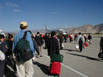Walking out to our plane to Chengdu.  The alternative to the plane is, and I'm not making this up, a 4 day bus ride.