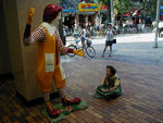 Maggie debating Ronald MonkDonald and a woman watching.  We usually draw stares and occasionally draw small crowds