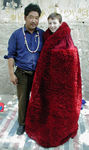 Tote with a winter monk's robe.  (He's got it on inside out.)