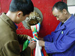 Men putting on new decorations