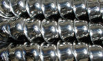 Chrome bowls.  Before many shrines similar bowls are filled everyday with water and sometimes with chayng