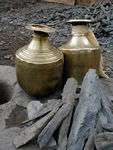 Water jugs.  There was a big wedding party here last night, and we say people washing dishes and heading home.