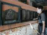 Tote with prayer wheels inside gate