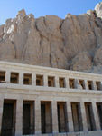 The temple was once surrounded by myrrh trees, garden beds, and approached by a grand sphinx-lined causeway.