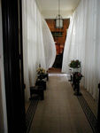 The entrance to Pensione Roma.  (The red carpet is missing.)  You reach this lobby after a climb up one of the foulest stairwells I have ever seen.  It seems that many Cairo hotels are on the upper levels of genuinely foul buildings