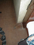 Bare wires on dirty carpet
