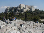 The Propylaea is the entryway into the Acropolis. Just in front of it and to the left is the pedestal for the offering to Agrippa, the victor of the Battle of Actium, who interceded for Athens, which had supported the loser, Mark Antony. To the right is the rebuilt temple of Athena Nike.  The Turks demolished the temple in 1686 to use the stones as defenses against the Venetians. The northern wing of the Propylaea was used by the Frankish dukes, who reconstructed the interior to make a two-story building. They were followed in the 12th century by Greek Orthodox bishops and, in the 14th century, by the dynasty of Florentine who turned it into a fortified castle with a Tuscan tower.  Heinrich Schliemann, the German excavator who discovered Troy, paid to have the tower dismantled in 1875.