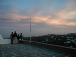 Watching the sunset from the top of the hill, next to a church, of course.