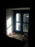 Oil lamp supplies in a window that was less tidy than in most churches
