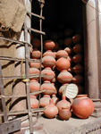 Pots are everywhere.  Tea is served in little disposable (!) clay cups.