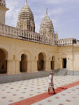 This is not the traditional red carpet.  These long mats of various colors are often placed in temples, where visitors must go barefoot, so you don't burn the bottoms of your feet off.
