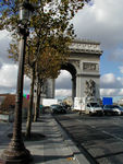 Big arch surrounded by traffic