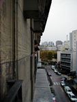 Looking out the window of our apartment at the organ grinder