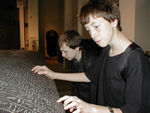 Duncan and Tote, unable to practice the piano, learn to play the sarcophagus